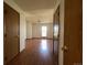 View of open bedroom area with hard wood floors, ceiling fan and natural light at 8181 S Fillmore Cir, Centennial, CO 80122