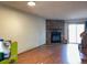 View of living room area with wood-style floors and fireplace at 8181 S Fillmore Cir, Centennial, CO 80122
