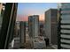 Enjoy breathtaking city views from your high-rise condo at sunset at 2001 Lincoln St # 2412, Denver, CO 80202