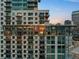 Modern high-rise with floor to ceiling windows and multiple balconies offering city views at 2001 Lincoln St # 2412, Denver, CO 80202