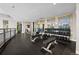 Well-equipped gym featuring weights, benches, and mirrors for a complete workout experience at 2001 Lincoln St # 2412, Denver, CO 80202