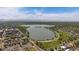 Beautiful aerial view of city lake and surrounding neighborhoods at 1372 Lowell Blvd # 1, Denver, CO 80204