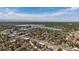 Aerial view of the city with a lake in the distance at 1372 Lowell Blvd # 1, Denver, CO 80204