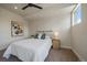 Serene bedroom with a comfortable bed, stylish side table, and simple decor at 1372 Lowell Blvd # 1, Denver, CO 80204