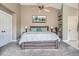 Comfortable bedroom with a plush carpet, neutral walls, and ample natural light at 16376 Flintlock Ct, Parker, CO 80134