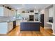 Bright kitchen with stainless steel appliances and granite countertops at 16376 Flintlock Ct, Parker, CO 80134