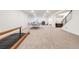 Finished basement with ping pong table and gymnastics equipment at 14319 Hop Clover St, Parker, CO 80134