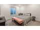 Basement bedroom with queen bed and window at 14319 Hop Clover St, Parker, CO 80134