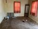 Living room with vintage decor, two windows, and natural light at 54 E Cornell Ave, Englewood, CO 80113