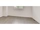 Empty bedroom boasts hardwood floors and natural light at 536 Cook St, Denver, CO 80206