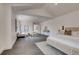 Spacious open concept bedroom with hardwood floors, sitting area, and natural lighting at 536 Cook St, Denver, CO 80206