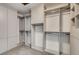 Walk-in closet boasts custom shelves, drawers, and ample storage space at 536 Cook St, Denver, CO 80206