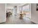 Inviting dining area with a round table, natural light, and easy access to living spaces, ideal for casual and formal meals at 536 Cook St, Denver, CO 80206