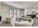Bright living room with stylish furnishings and seamless access to the kitchen, perfect for modern living and entertaining at 536 Cook St, Denver, CO 80206
