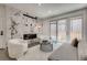 Chic living area with a modern fireplace, plush seating, and access to the outdoors, creating a cozy yet sophisticated ambiance at 536 Cook St, Denver, CO 80206