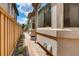 Side yard with brick pathway and garden bed at 536 Cook St, Denver, CO 80206
