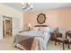 Serene bedroom with soft lighting, and an ensuite bathroom for convenience at 9320 E Center Ave # 4B, Denver, CO 80247