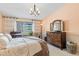 Cozy bedroom featuring natural light, stylish furniture, and serene ambiance at 9320 E Center Ave # 4B, Denver, CO 80247