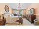 Cozy bedroom with large window, letting in natural light, and charming decor at 9320 E Center Ave # 4B, Denver, CO 80247