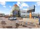 Commercial building with prominent signage at 9320 E Center Ave # 4B, Denver, CO 80247