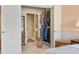 Spacious walk-in closet with custom shelving, providing ample storage and organization at 9320 E Center Ave # 4B, Denver, CO 80247