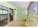 Enclosed sunroom with ample seating and decor at 9320 E Center Ave # 4B, Denver, CO 80247