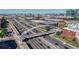 Aerial view showcases highway and buildings at 1521 Central St # 2D, Denver, CO 80211