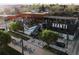 Bustling restaurant with rooftop seating, outdoor staircase and pedestrian activity, perfect for socializing at 1521 Central St # 2D, Denver, CO 80211