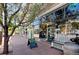 Charming storefront with large windows and outdoor seating in a vibrant commercial district at 1521 Central St # 2D, Denver, CO 80211