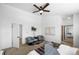 Spacious bedroom with ceiling fan and mirrored closet doors at 453 N 9Th Pl, Brighton, CO 80601