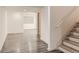 Basement view including stairs, modern flooring, and an open floor plan at 10201 Rifle St, Commerce City, CO 80022