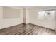 This room offers modern flooring, and a window for natural light at 10201 Rifle St, Commerce City, CO 80022