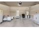 Spacious garage with ample storage and workspace at 10201 Rifle St, Commerce City, CO 80022