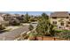 Charming street view showcasing well-maintained homes and lush landscaping at 10201 Rifle St, Commerce City, CO 80022