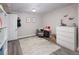 Finished basement area with gray floors at 1712 S Gilpin St, Denver, CO 80210