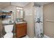 Bathroom featuring a vanity sink and shower with a curtain at 1712 S Gilpin St, Denver, CO 80210