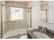 Bathroom with a shower/tub combo and granite vanity sink at 1712 S Gilpin St, Denver, CO 80210
