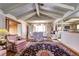 Elegant dining room with stylish lighting, hardwood floors, and classic furnishings at 3820 S Ames St, Denver, CO 80235