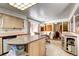 Spacious kitchen with a center island and eat-in dining area at 3820 S Ames St, Denver, CO 80235
