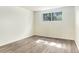Bedroom with window and hardwood flooring at 2375 S Linden Ct # 201, Denver, CO 80222