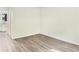 Bedroom with hardwood flooring and fresh neutral paint at 2375 S Linden Ct # 201, Denver, CO 80222