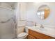Bathroom features a walk-in shower, a vanity with a sink, and a medicine cabinet at 16246 E Hamilton Pl, Aurora, CO 80013