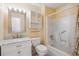 Bright bathroom with white vanity, marble countertop, mirrored cabinet and shower with updated showerhead at 16246 E Hamilton Pl, Aurora, CO 80013