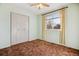 Bedroom features carpet flooring, natural light, and a closet at 16246 E Hamilton Pl, Aurora, CO 80013