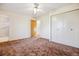Bedroom features carpet flooring, a closet, and ensuite bathroom at 16246 E Hamilton Pl, Aurora, CO 80013