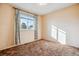 Bedroom features carpet flooring and natural light at 16246 E Hamilton Pl, Aurora, CO 80013