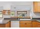 Kitchen features an open layout with a view to the backyard at 16246 E Hamilton Pl, Aurora, CO 80013