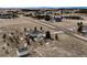 Aerial view of property featuring a lush backyard with deck and proximity to walking trails at 34942 Wagon Wheel Trl, Elizabeth, CO 80107