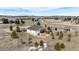 Aerial view of the home showing the deck, patio and detached building at 34942 Wagon Wheel Trl, Elizabeth, CO 80107
