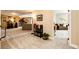 Finished basement with neutral carpet and decor leading to the adjacent living room at 34942 Wagon Wheel Trl, Elizabeth, CO 80107